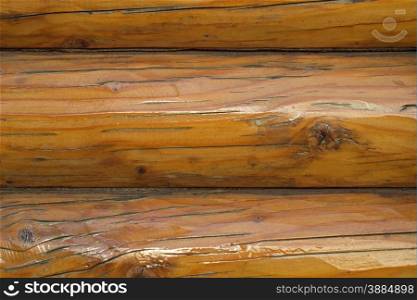 folded wall of the wooden frame of a beautiful brown color. Wooden houses