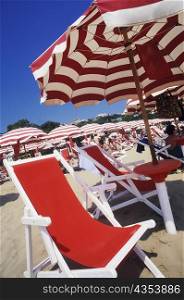 Folding chairs on the beach, Italy