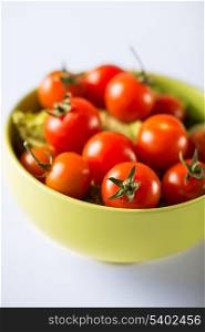 food and cooking concept - cherry tomatoes in bowl