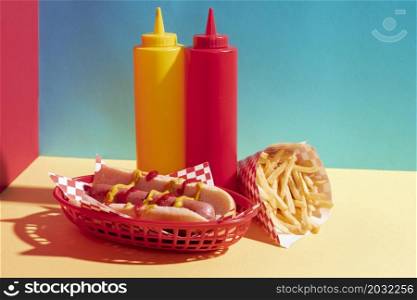 food assortment with hot dog sauce bottles