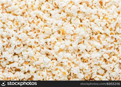 food background - cooked salted popcorn close up