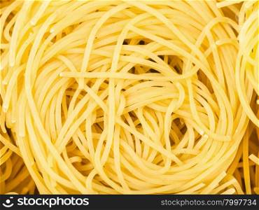 food background - durum wheat semolina pasta fidelini close up