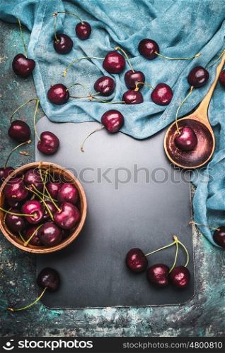 Food background for Cherry berries recipes with cooking spoon and napkin , top view frame