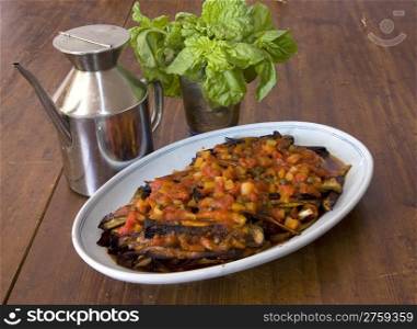Food background of eggplant and pepper stew from italian cuisine