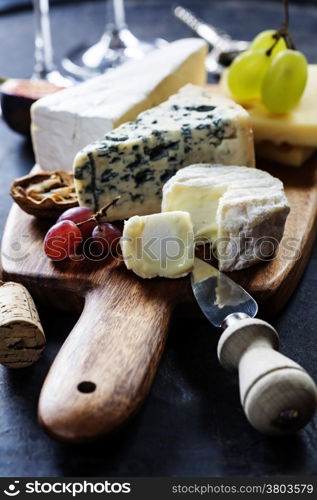 Food background with Wine, cheese and Grape.