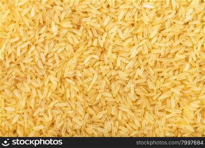 food background - yellow parboiled long-grain Indica rice