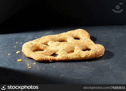 food, baking and cooking concept - close up of cheese bread on kitchen table. close up of cheese bread on kitchen table