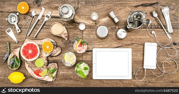 Food blogger desk with bar tools, accessories and electronic devices. Flat lay background