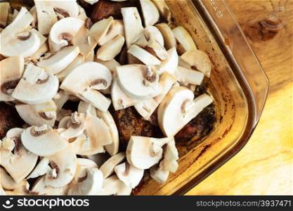 Food. Closeup of roasted chicken meat with champignons mushrooms dinner meal. Cooking and traditional cuisine.