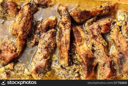 Food. Closeup of roasted chicken meat with spices and herbs dinner meal. Cooking and traditional cuisine.