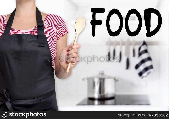 Food cook holding wooden spoon background.. Food cook holding wooden spoon background