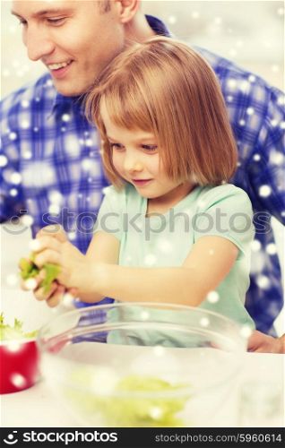 food, family, childhood, happiness and people concept - happy father with little girl making dinner at home