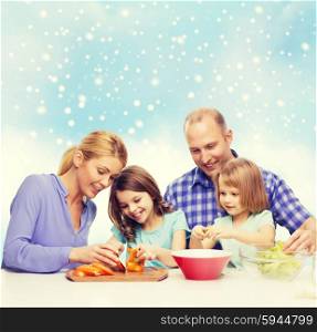 food, family, children, happiness and people concept - happy family with two kids making dinner over blue sky and snowflakes background