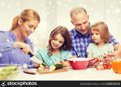 food, family, children, happiness and people concept - happy family with two kids making dinner at home