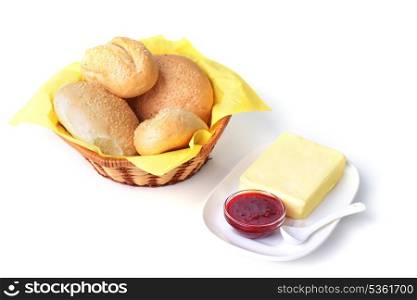 food for breakfast. buns, butter and jam