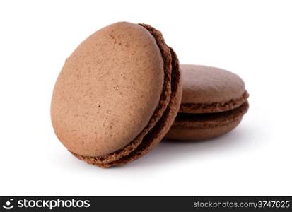 Food: group of fresh chocolate macarons, isolated on white background