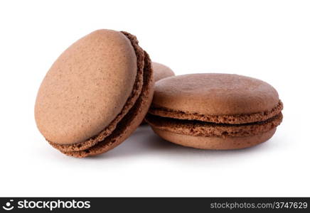 Food: group of fresh chocolate macarons, isolated on white background