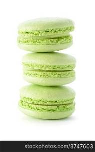 Food: group of fresh green macarons, isolated on white background