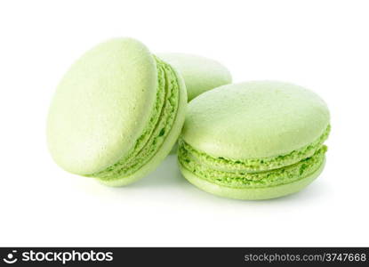 Food: group of fresh green macarons, isolated on white background