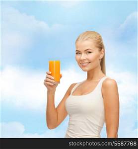 food, healthcare and diet concept - smiling young woman holding glass of orange juice