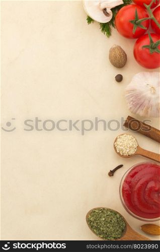 food ingredients and spices on aged background