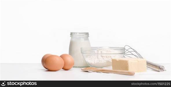 Food ingredients on the table, sugar eggs and flour. Food ingredients on the table