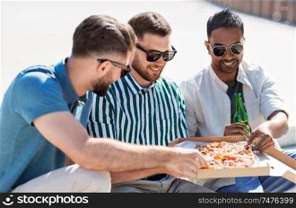 food, leisure and people concept - happy male friends drinking beer and eating takeaway pizza on street in summer. male friends eating pizza with beer on street