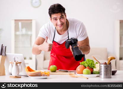 Food photographer taking photos in kitchen