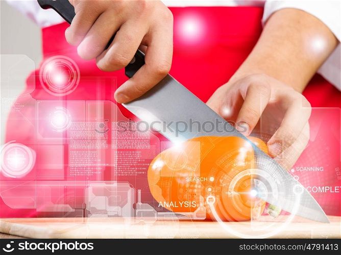 Food preparation. Close up of cook hands cutting vegetables with knife