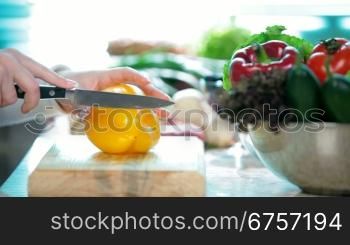 Food Preparation - Cutting a yellow bell Pepper