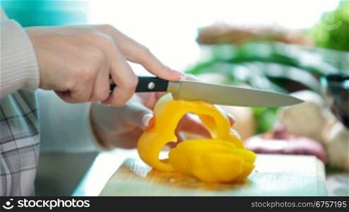 Food Preparation - Cutting a yellow bell Pepper