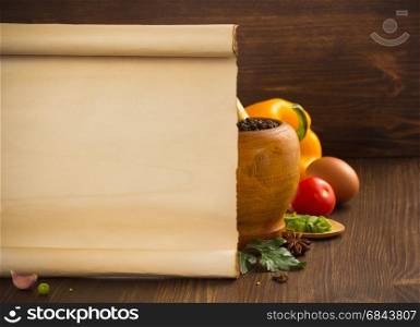 food spice and old paper on wood. food spice and old paper on wooden background