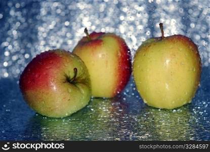 food three apples in water. closeup