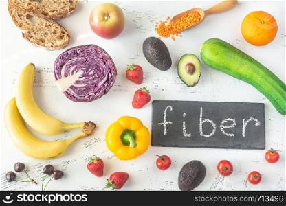 Foods rich in fiber on the white background: top view