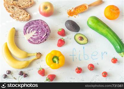 Foods rich in fiber on the white background: top view