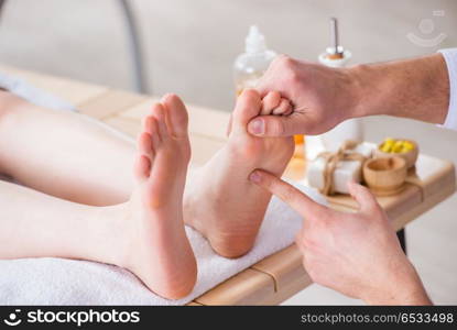 Foot massage in medical spa