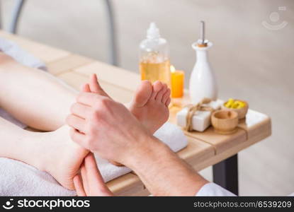 Foot massage in medical spa