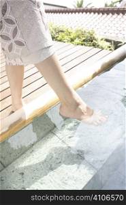 Foot of Japanese woman soaking in the hot spring