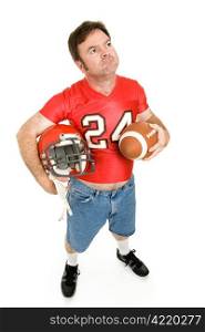 Football fan in his old high school jersey, remembering the good old days. Full body isolated on white.