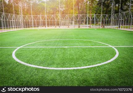 Football field - Futsal field green grass sport outdoors white line circle center and goal nets background