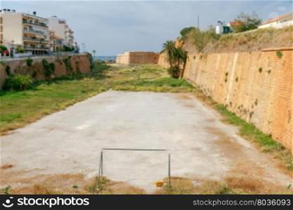 Football field on the shore.. Improvised soccer field in a vacant lot in Chania. Greece. Crete.