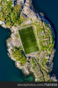 Football field stadium in Henningsvaer from above.