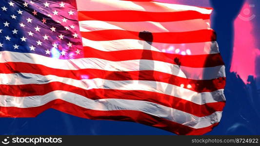 football or soccer fans and USA flag at a game in a stadium