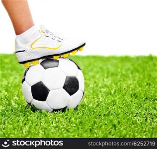 Football player, men foot on the ball, playing sport game at outdoor stadium, green grass field, isolated on white with text space, conceptual image of competition, goal and healthy active lifestyle