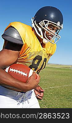 Football Player Running with Ball