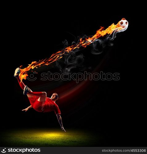 Football player with ball. Image of football player in red shirt