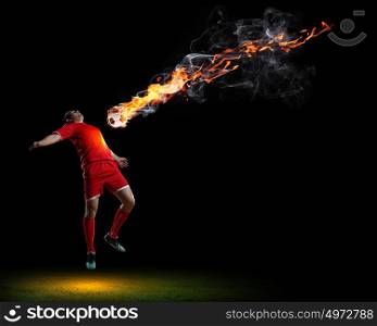 Football player with ball. Image of football player in red shirt