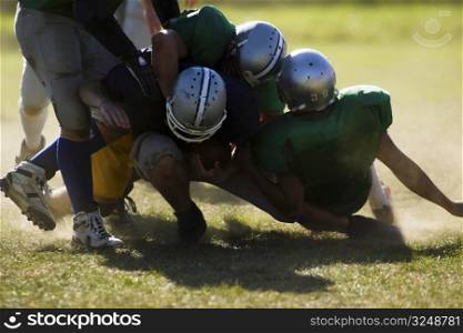 Football players are is serious action.