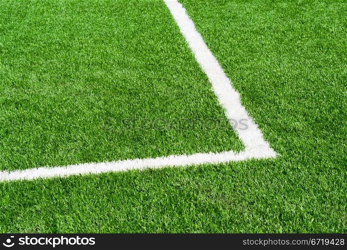 Football (soccer) field corner with white line corner