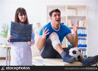 Football soccer player visiting doctor after injury